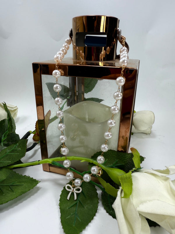 Chain necklace with pearl and Motif