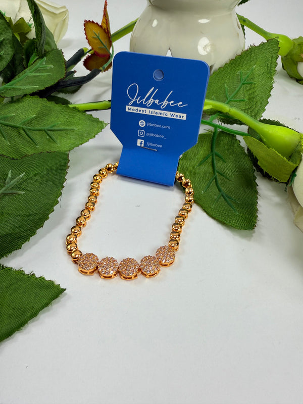 Golden braclet with stones